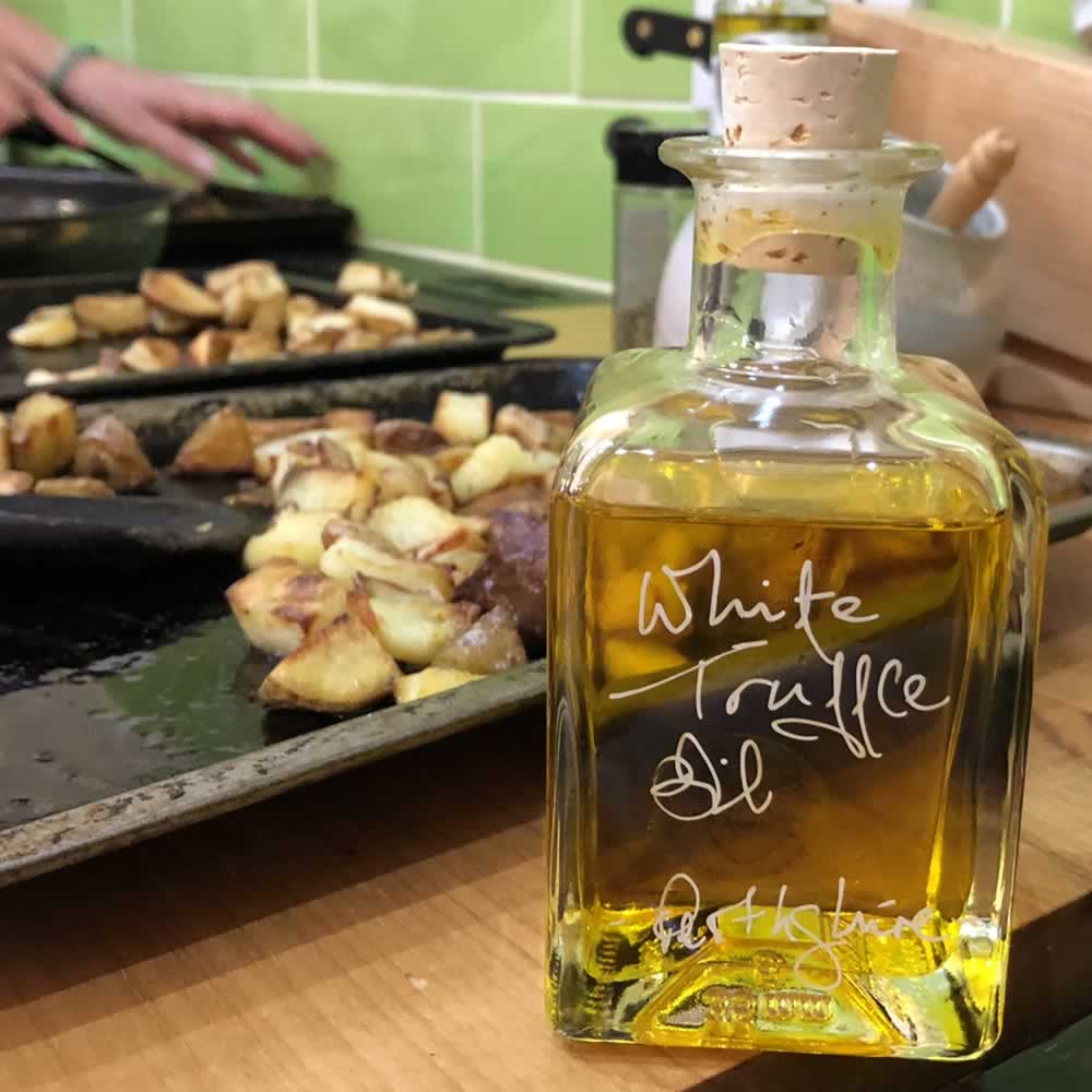 White Truffle Oil being used to make Truffle Oil and Parmesan Wedges