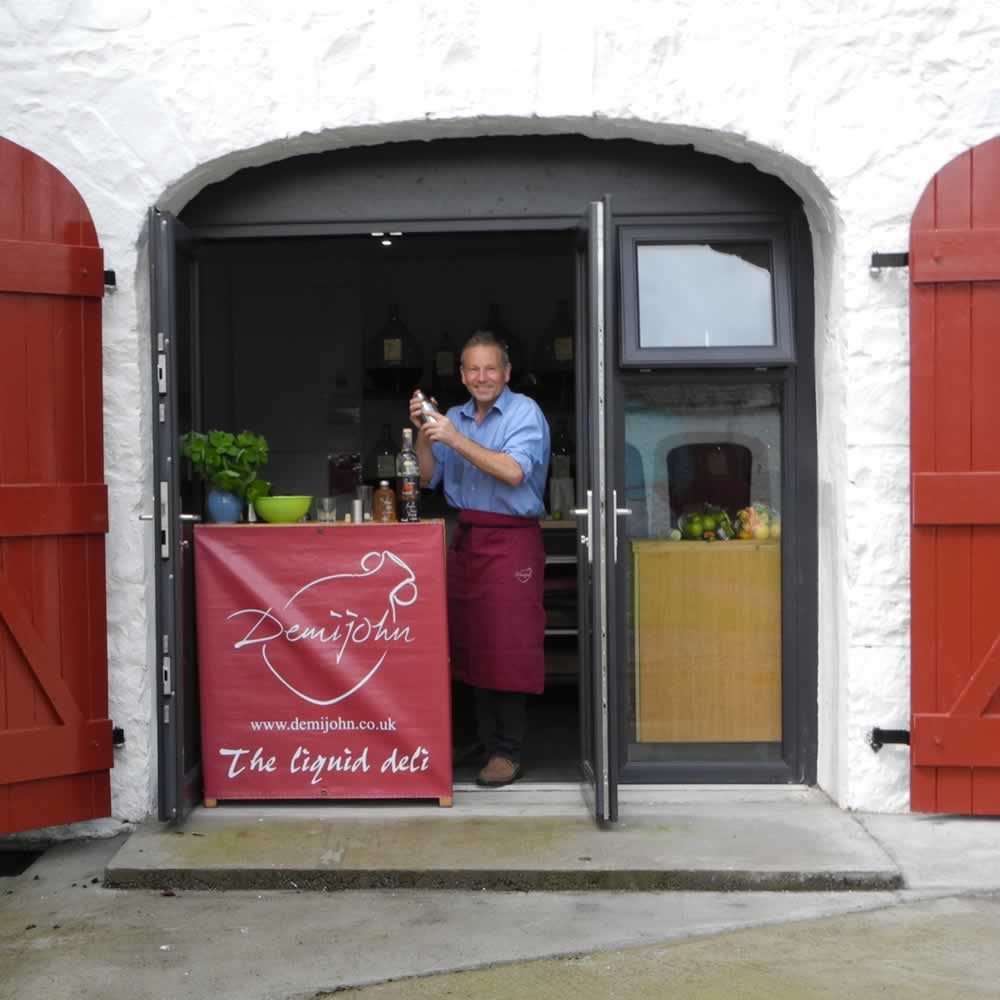 Angus mixing cocktails for an event at Demijohn in Glenlair Steadin