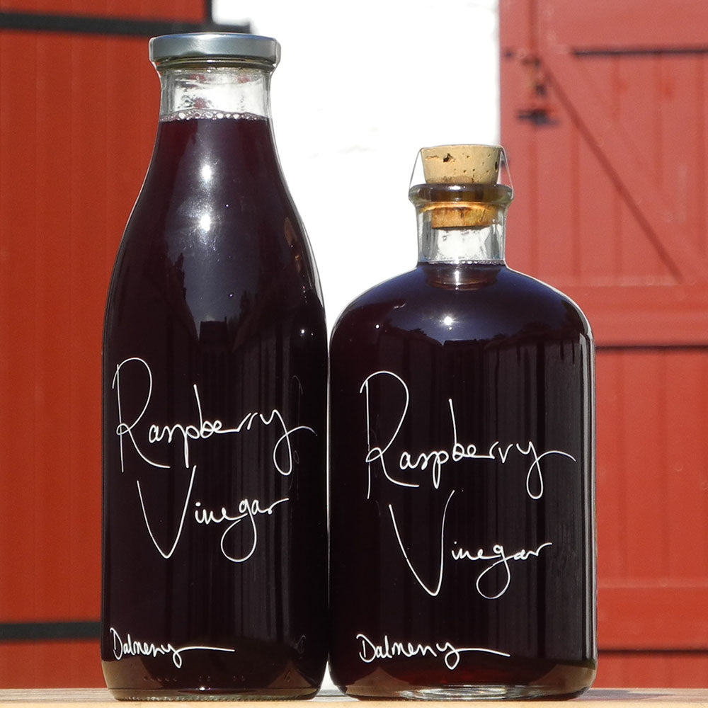 Two different litre bottles of Scottish Raspberry Vinegar