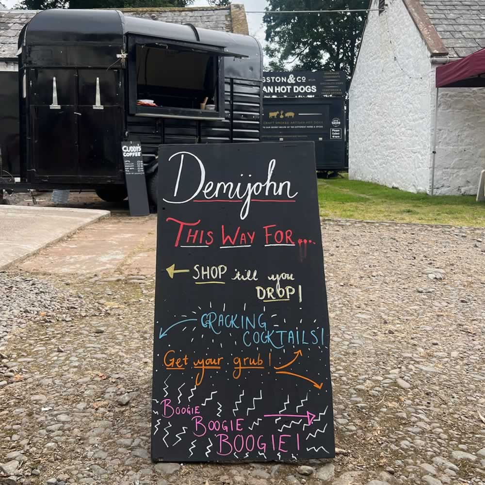 Memories of Glenlair Feastival 2025, an exclusive music festival with food and drink. Blackboards