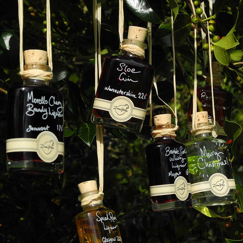 More than Gin Baubles (Set of 6 Liqueur Miniatures) includes Morello Cherry Brandy Liqueur Seville Orange Gin Bramble Scotch Whisky Liqueur Spiced Rum Liqueur Raspberry Vodka Liqueur and Sloe Gin with option for personalised Christmas message