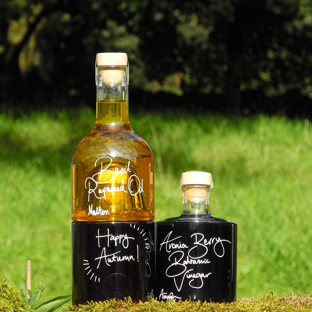 Autumn Salad Dressing Set with Bail Rapeseed Oil Bramble Vinegar and Aronia Berry Balsamic Vinegar in stacking bottles with a personalised handwritten message