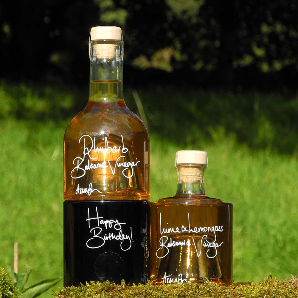 The Balsamic Dressing Gift Set with Rhubarb Balsamic Vinegar, Black Garlic Balsamic Vinegar and Lime and Lemongrass Balsamic Vinegar in stacking bottles and a hand written message