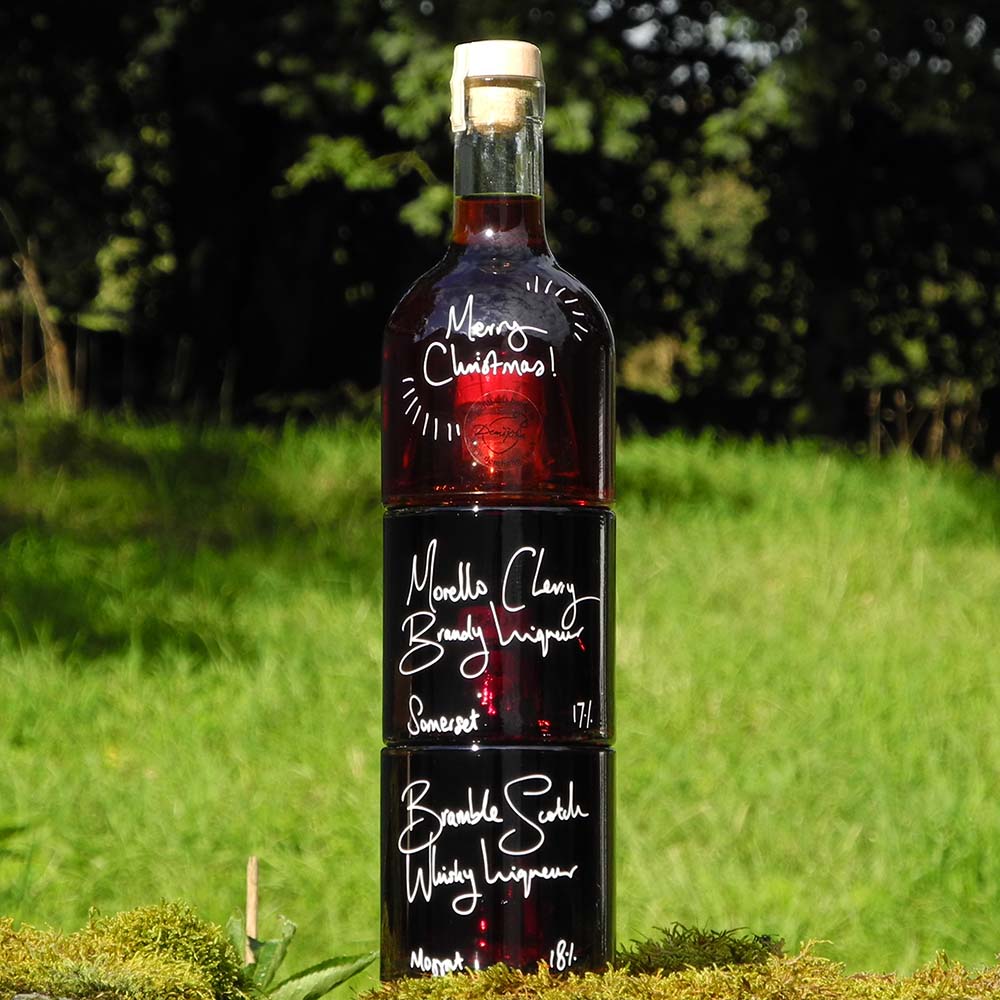 The Christmas Stacker, a beautiful stacking Christmas gift idea with 3 fruity liqueurs and a personalised message