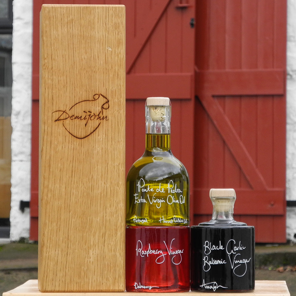 Bread Dipper and Salad Dressing Gift Set with Oak Gift Box containing Portuguese Olive Oil, Black Garlic Balsamic Vinegar and Raspberry Vinegar in Stacking Bottles and handwritten bottle messages