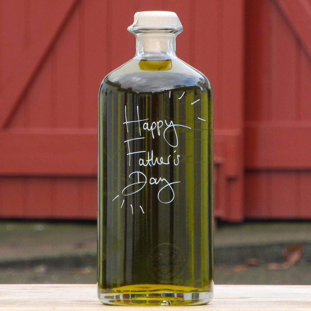 700ml bottle of Ponte de Pedra Extra Virgin Olive Oil from Portugal with handwritten bottle message tgat says Happy Father's Day