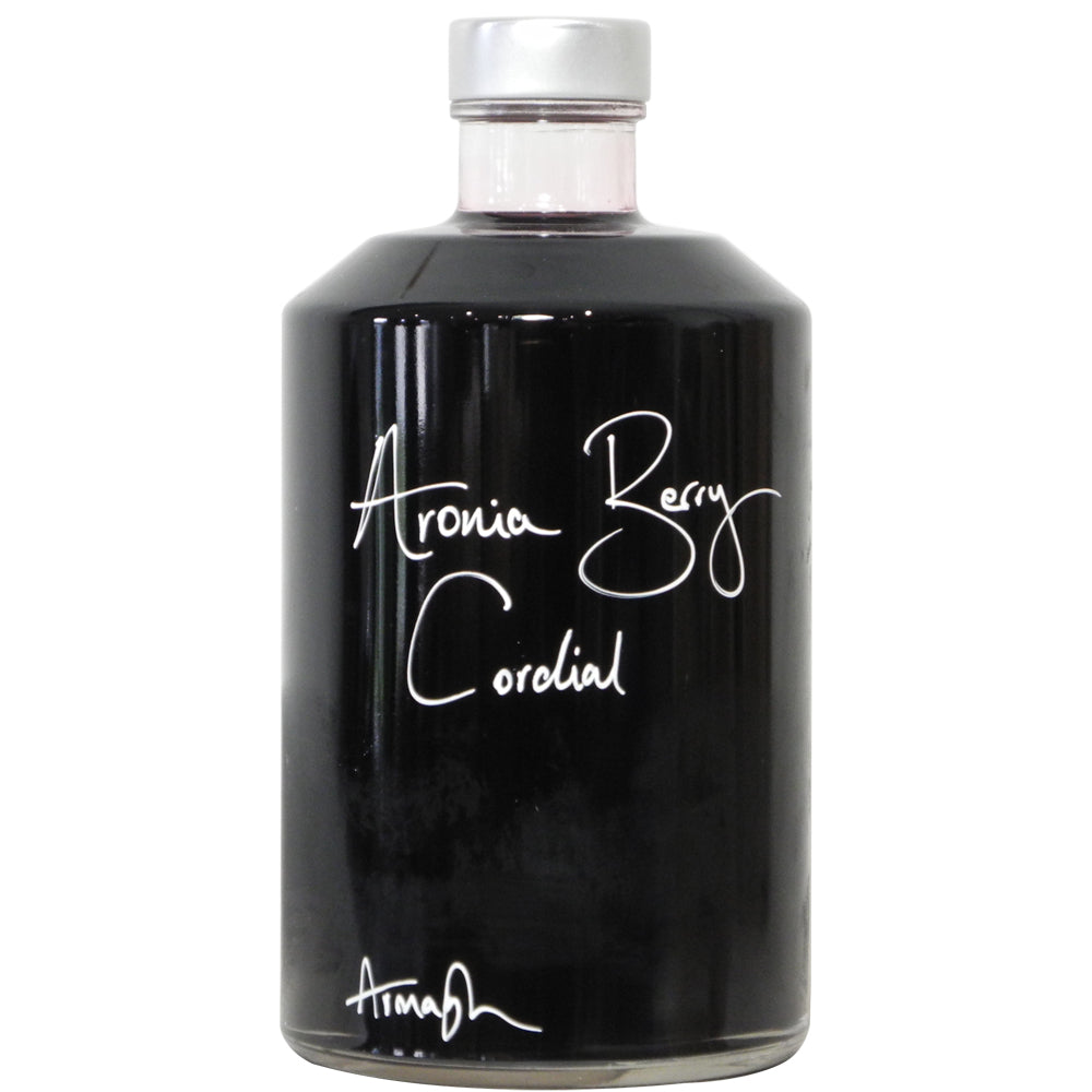 Aronia Berry Cordial with handwritten bottle message in white pen.